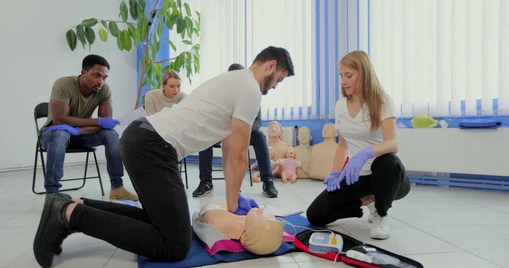 Boost Your Business Resilience: The Essential Guide to First Aid & CPR Training Across the UK - Manual Handling Training Article